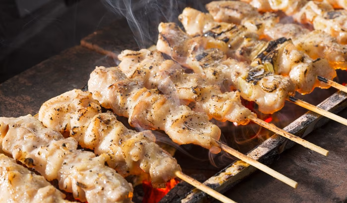 Yakitori skewers on binchōtan charcoal